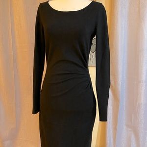 Black, long sleep, cover the knees length, pencil type skirt part